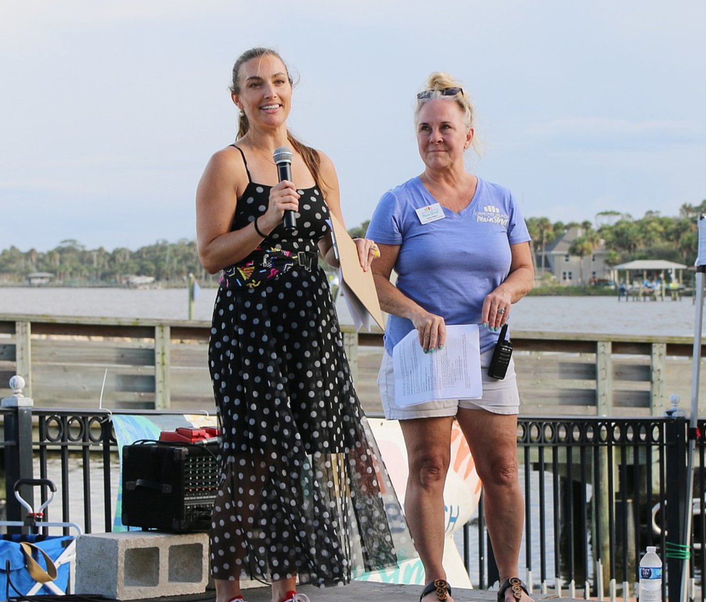 Ormond MainStreet leaders on stage by the river during the organization's 30th anniversary '90s block party in downtown Ormond Beach.